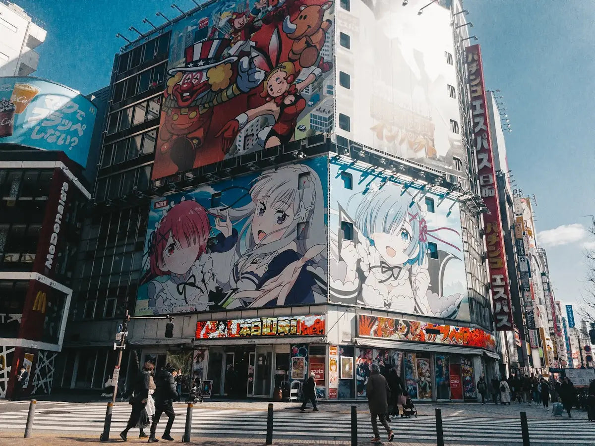 Building with large anime billboards in a city