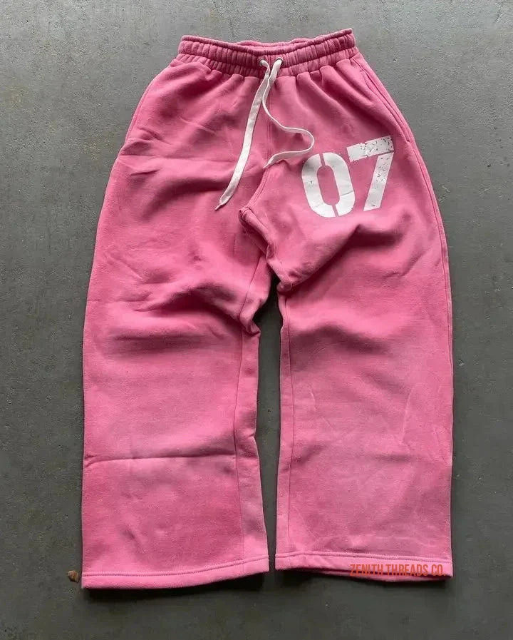 Pink sweatpants with ’07’’ printed on one leg.