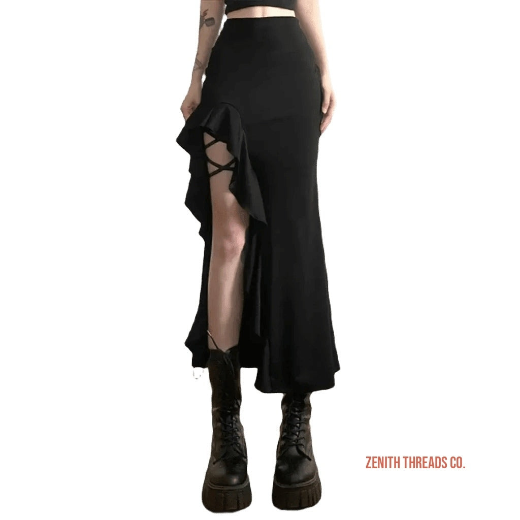 Black ruffled maxi skirt with a side slit worn with combat boots.