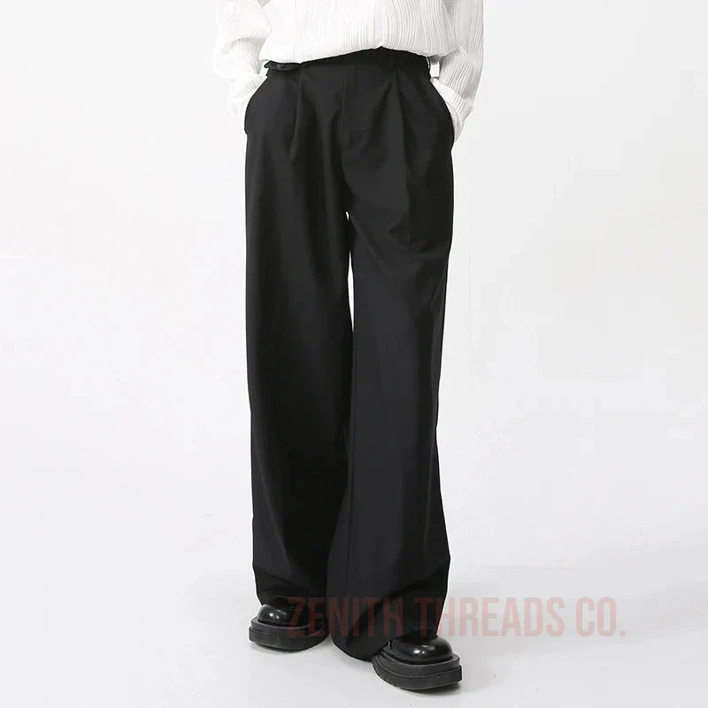 Black wide-leg dress pants with pleats.