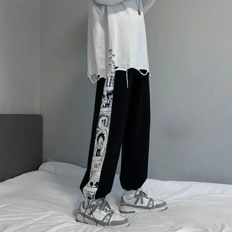 Black sweatpants featuring an anime stripe from the Anime Inspired One Piece Pants Collection