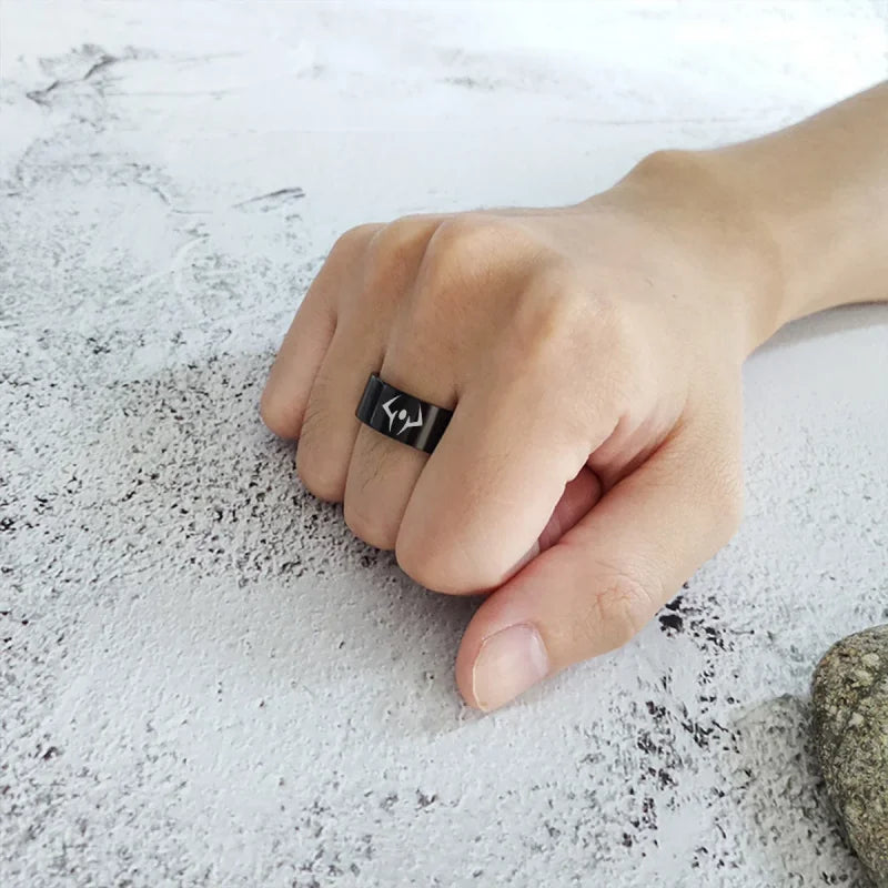 Black stainless steel Jujutsu Kaisen ring featuring white Ryomen Sukuna symbol