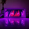 Illumiscene anime shadow light box showcasing illuminated Sasuke Uchiha paper-cut shadow art