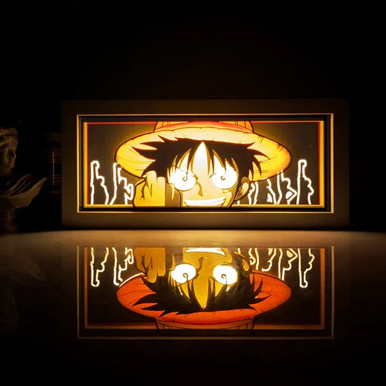 Illumiscene anime shadow light box featuring illuminated Zoro in paper-cut shadow art