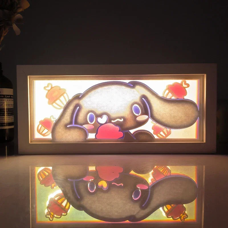 Illuminated Cinnamoroll character art in Illumiscene anime shadow light box decor