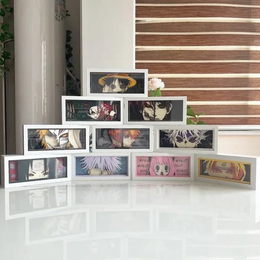 Anime character art in white frames for Illumiscene Anime Shadow Light Box