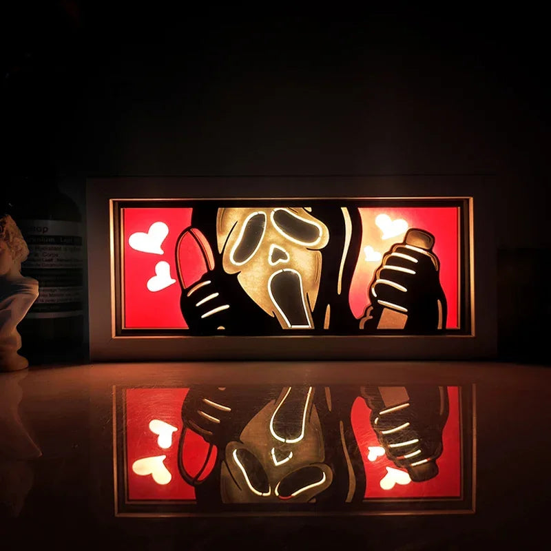 Illuminated Ghostface artwork in Illumiscene anime shadow light box showcasing paper-cut shadow art