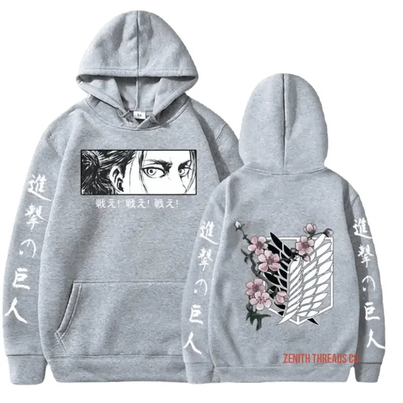 Grey hoodie with Attack on Titan anime artwork and Japanese characters printed on it.