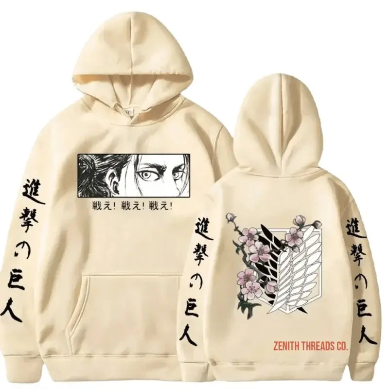 Cream-colored hoodie with Attack on Titan anime artwork and Japanese characters printed on it.