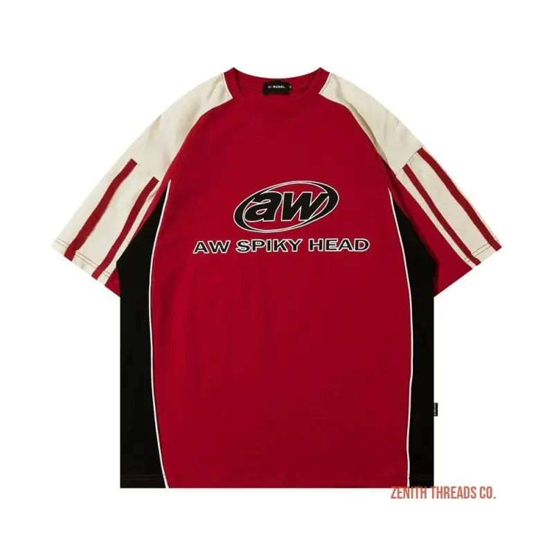 Red, black and white athletic-style t-shirt with ’AW SPIKY HEAD’ logo text.