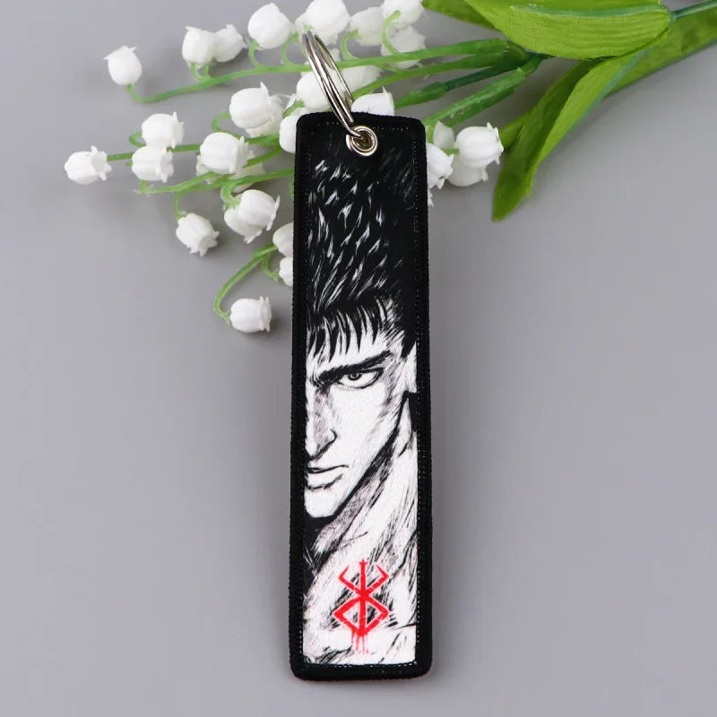 Berserk anime embroidery keychain unleashes dark streetwear fashion for fans