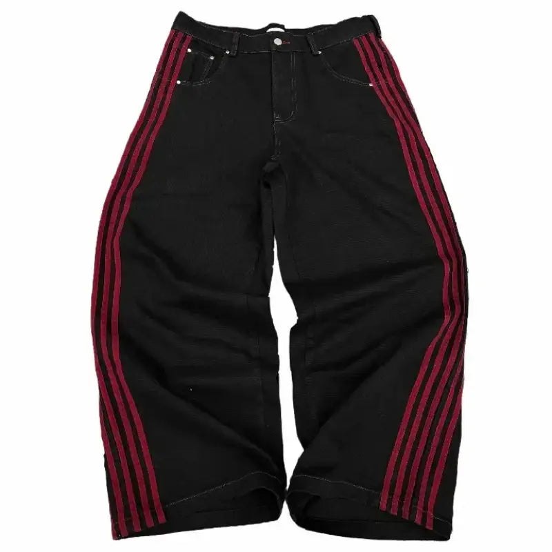 Black jeans with red vertical stripes down the sides.