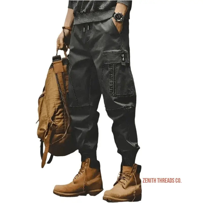 Black cargo pants with multiple pockets and drawstring waist.