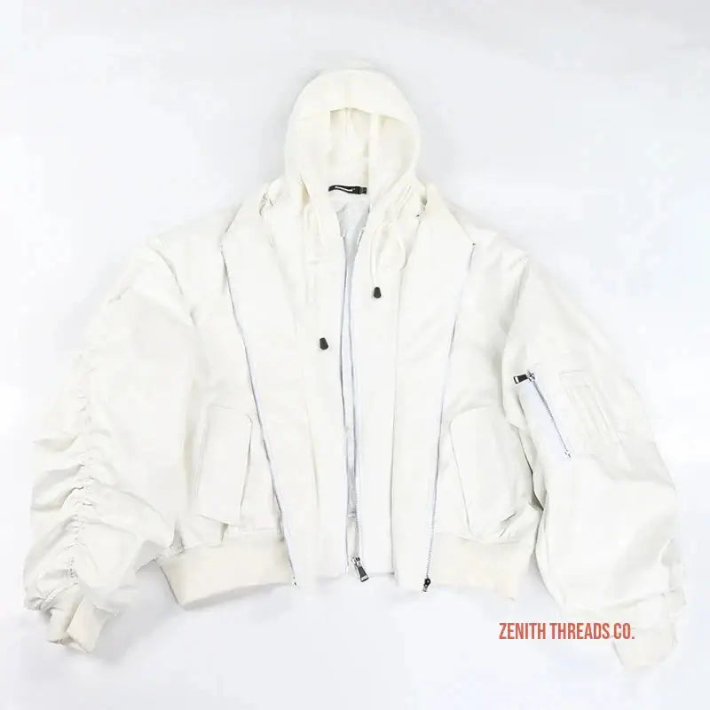 White cropped bomber jacket with multiple zippers.