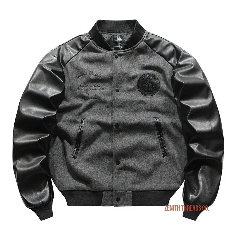 Black varsity-style bomber jacket with leather sleeves and snap buttons.