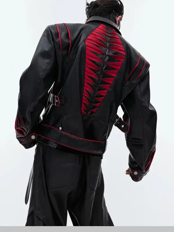 Black leather jacket with red spine-like design details along the back and sleeves.