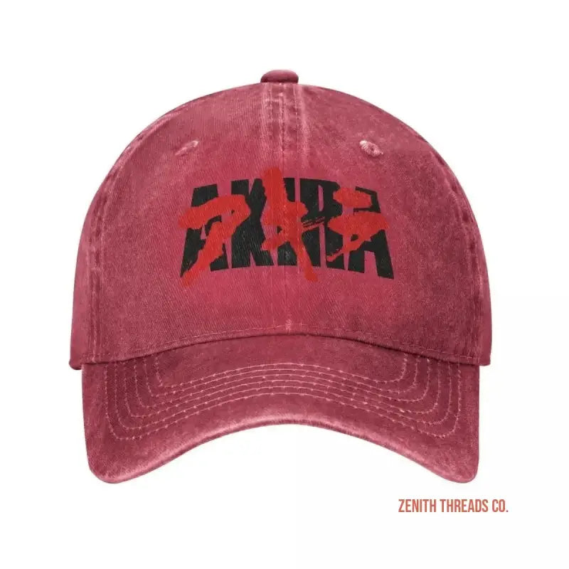 Red baseball cap with ’AKIRA’ text logo printed in black.