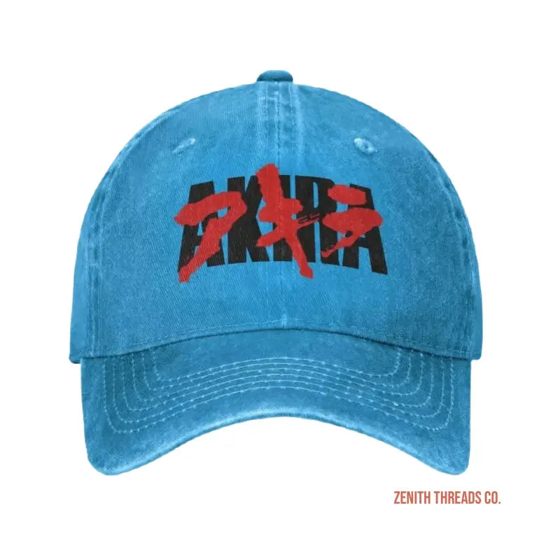 Light blue baseball cap with red and black ’AKIRA’ text logo.