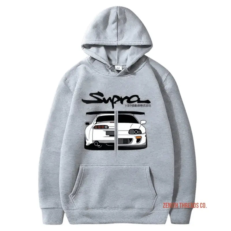 Grey hoodie featuring a Toyota Supra car design and logo print on the front.