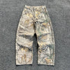 Urban camo print baggy pants showcasing stylish camouflage pattern for streetwear fashion