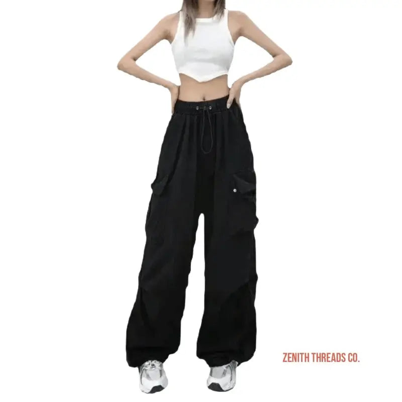 Black cargo pants with drawstring waist and side pockets.