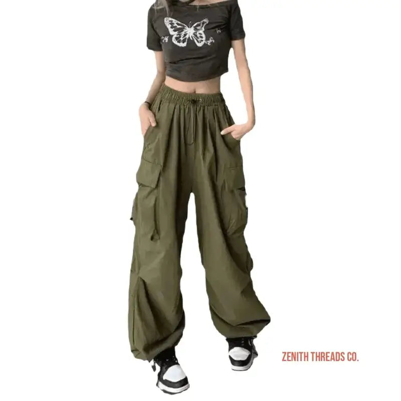 Olive green cargo pants with elastic waistband and multiple side pockets.