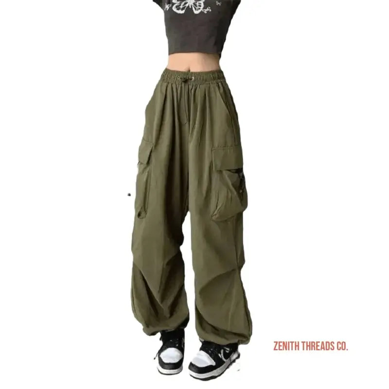 Olive green cargo pants with multiple pockets and elastic cuffs.