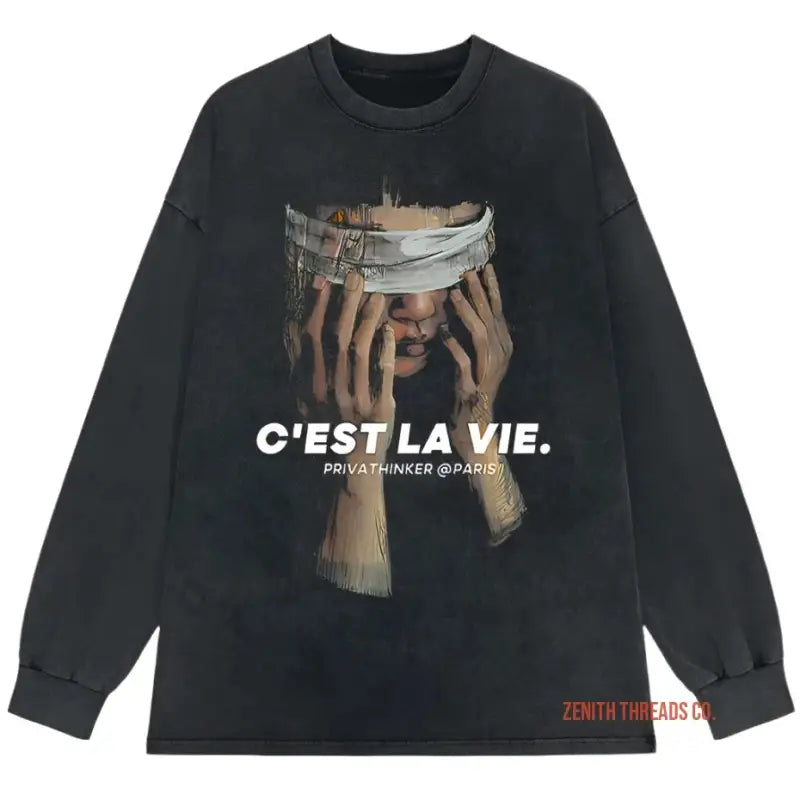 Black long-sleeve t-shirt with ’C’EST LA VIE’ text and hands holding a crown graphic.