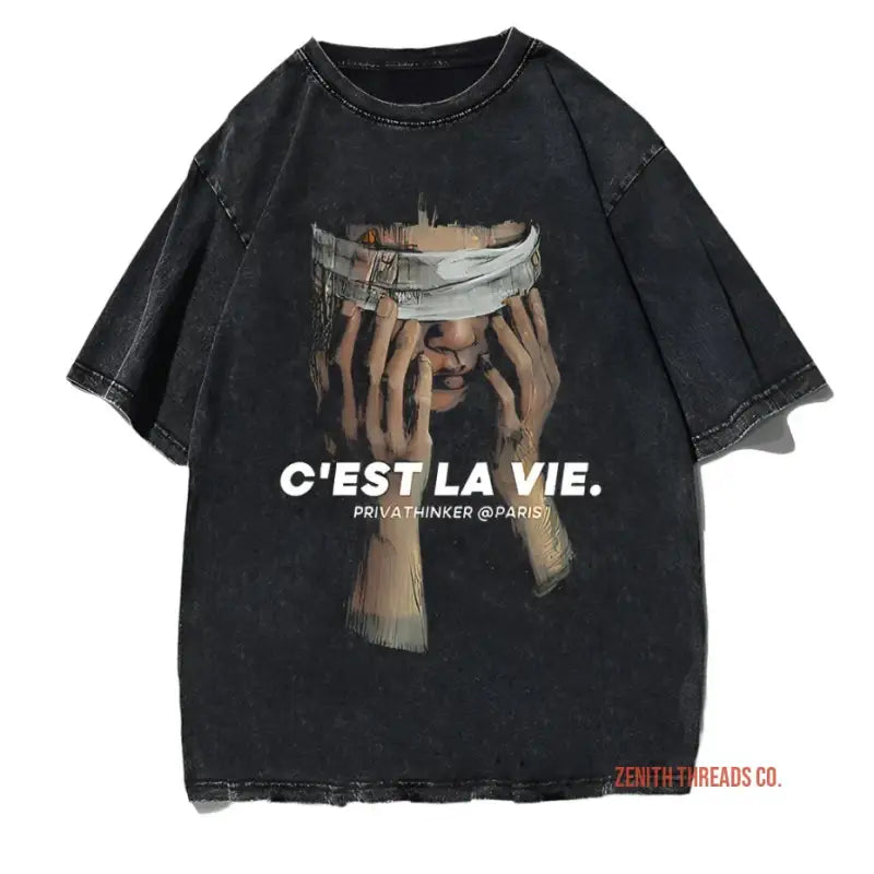 Black t-shirt with hands holding a cup and ’C’EST LA VIE’ text printed on the front.