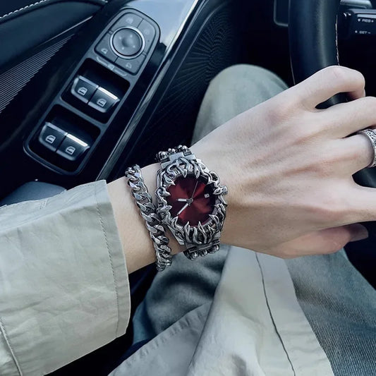 Ornate silver watch with red face from Futuristic Anime Inspired Claw Alabaster Watch