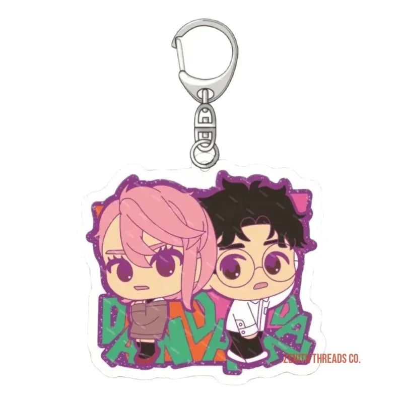 Anime-style keychain charm featuring two chibi characters with purple accents.