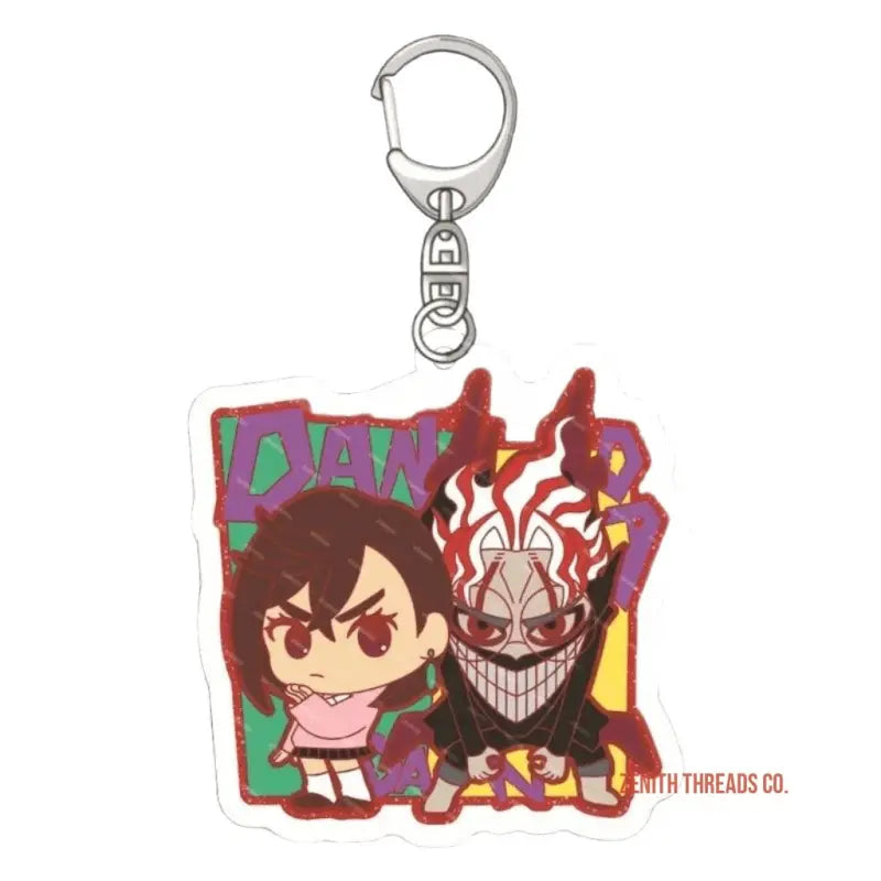 Anime-style keychain charm featuring two cartoon characters with a colorful design.