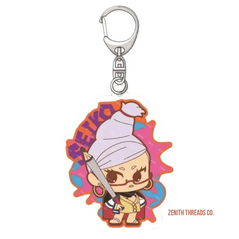 Cartoon-style keychain charm featuring a character with a white head wrap and yellow outfit.