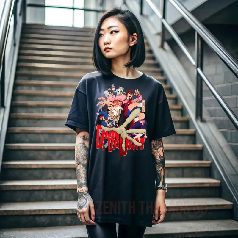 Black graphic t-shirt featuring red and colorful anime-style artwork.