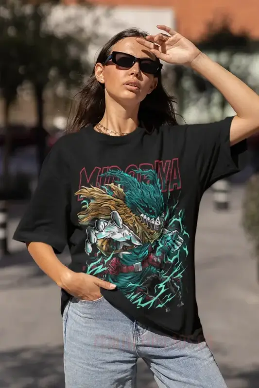 Black graphic t-shirt featuring a dramatic eagle and dragon design in turquoise and gold colors.