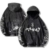 Distressed black hoodie featuring anime graphics for Japanese streetwear enthusiasts