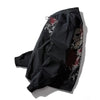 Black bomber jacket with dragon embroidery in Japanese streetwear anime style