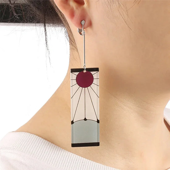 Rectangular Demon Slayer Hanafuda earrings featuring a sun design for anime fans