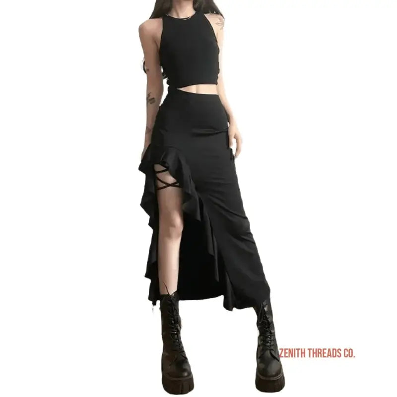 Black asymmetrical ruffled skirt paired with a crop top and combat boots.