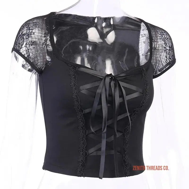 Black lace-trimmed corset top with sheer cap sleeves and ribbon lacing detail.