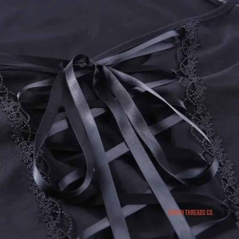 Black satin ribbons intertwined together.