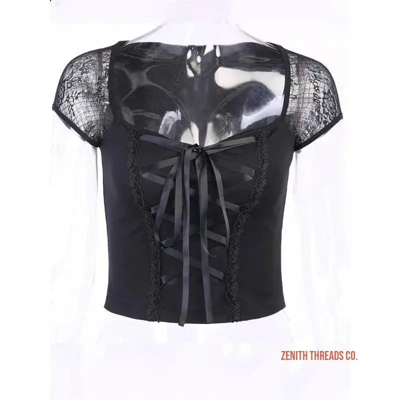 Black lace-trimmed corset top with cap sleeves and ribbon tie detail.