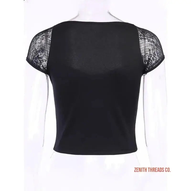 Black crop top with lace cap sleeves.