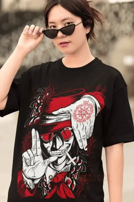 Black t-shirt featuring a red and white graphic design of a character wearing sunglasses making hand gestures.