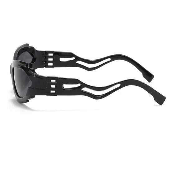 Black futuristic sunglasses featuring a unique s-shaped frame in a hollow style s-shaped design