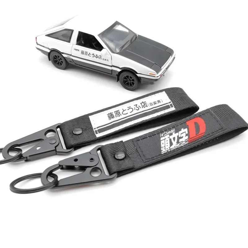 Initial D car model and keychains in a JDM anime design for enthusiasts