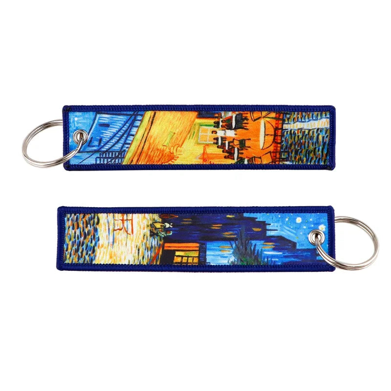 Two zinc alloy keychains featuring Van Gogh paintings and Japanese waves embroidered design