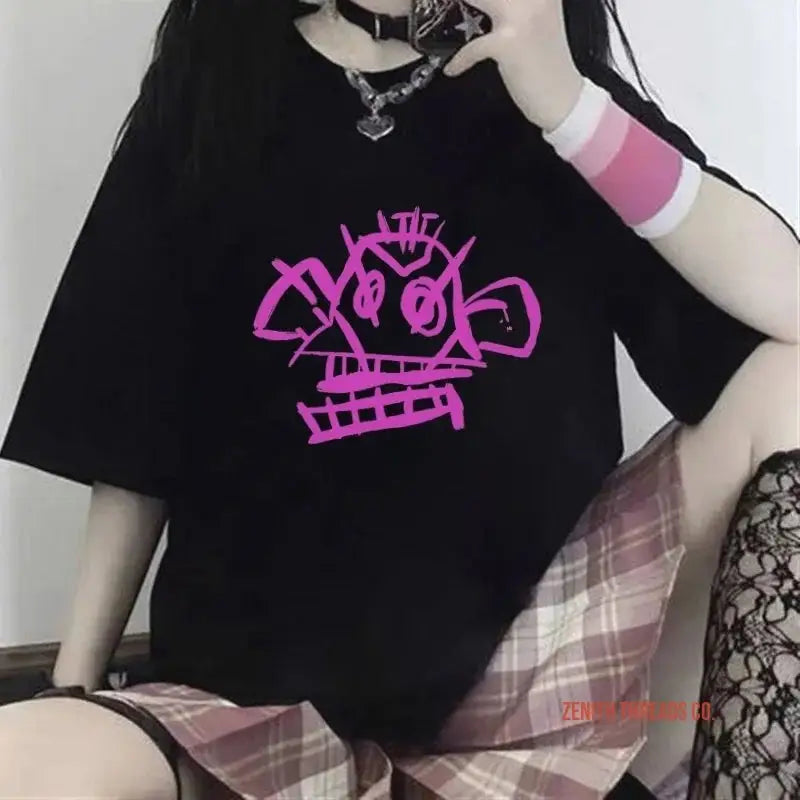 Black t-shirt with a pink graffiti-style design on the front.