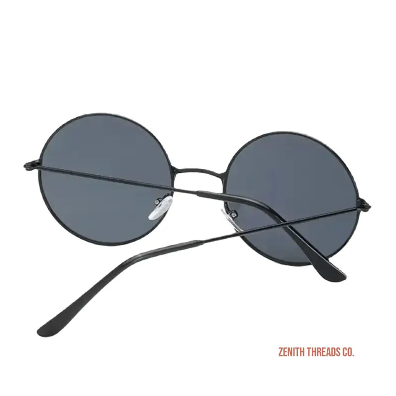 Round black sunglasses with metal frames.