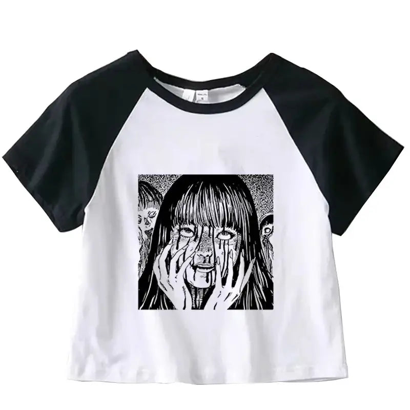 Black and white raglan crop top featuring manga-style artwork on the front.